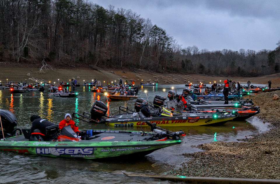 GEICO Bassmaster Classic Champions Cliff Pace and Skeet Reese line up beside the ramp awaiting takeoff. 