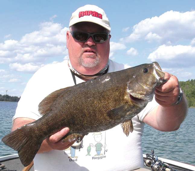 <br>Lawrence Ewart
<br>New York
<br>7-13
<br>St. Lawrence River, New York
<br>5 1/2-inch E-BAITS trick stix (perch)