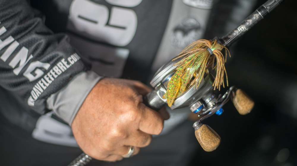 The profile of a bulky, lighter jig made all the difference. Bulk also slowed rate of fall to prolong strike zone time. For the 5/16-ounce jig he chose root beer and green flake patterns with matching, oversized chunk-style trailer. 