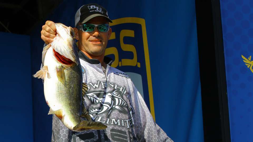 The pros knew big fish would be caught in the A.R.E. Truck Caps Bassmaster Elite at Lake Okeechobee last week. After dock talk that the Big O wasnât producing weights like the 2012 Elite visit, that was quickly disproved. Tyler Carriere showed how it was done with this Day 1 9-pound, 5-ounce lunker that held on for the Phoenix Boats Big Bass of the event, earning the rookie $1,500. <p> <em>All captions: Mike Suchan</em>