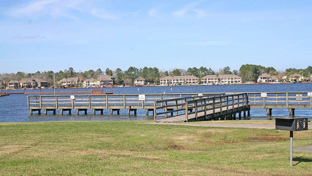 Lake Conroe is bordered on the south end of the lake by private homes and condominiums. Pictured is another fishing pier in the park. Also, the docks will be a great place to get pictures of the pros as they wait their turn for to blast off up the lake.