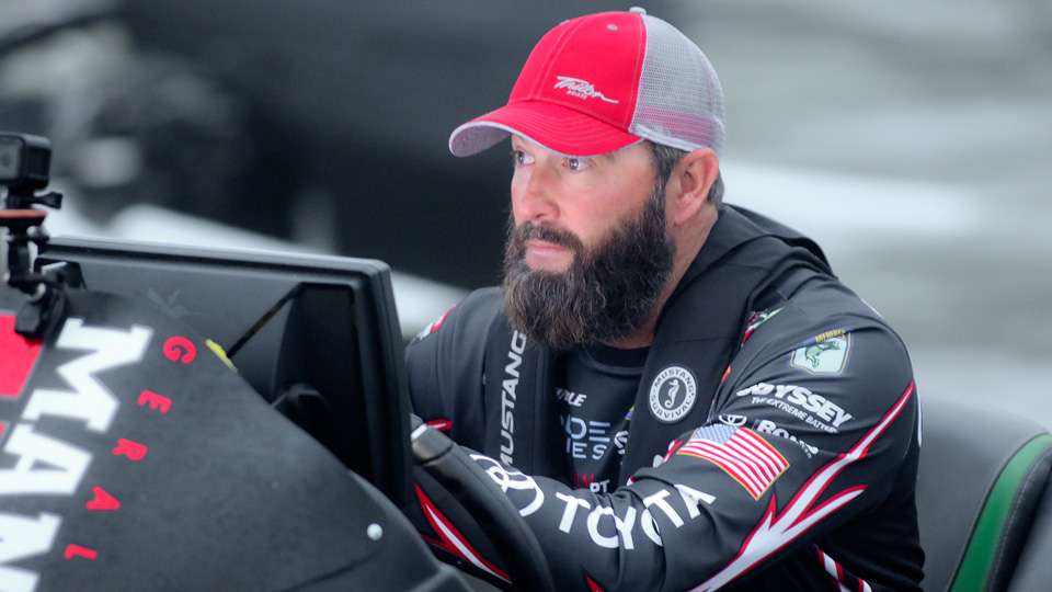 Steve Bowman positioned himself near the morning launch area and took photos of angler's running to their first fishing spots on the final day of practice. 