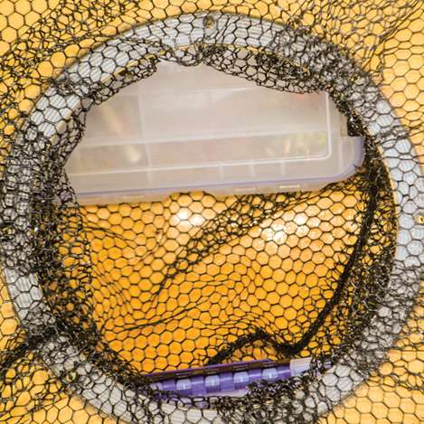 2. Put the netting inside and spread it out as much as possible. Use your tacklebox to help stretch out the net.