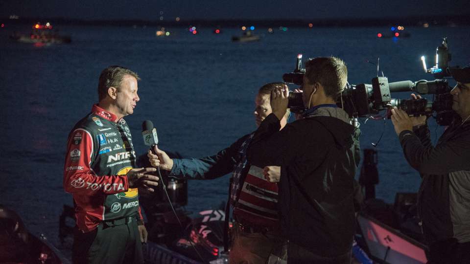 Kevin VanDam gets interviewed by reporters.