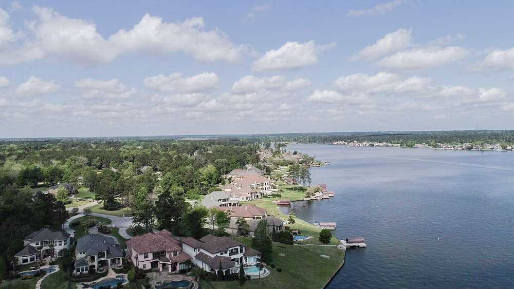 Some areas of the lake have massive houses with pools and large patio areas. 