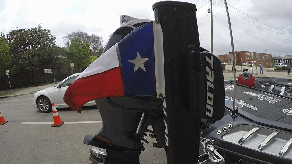 The Texas flag on local angler Keith Combs' boat stands straight out from the high winds.