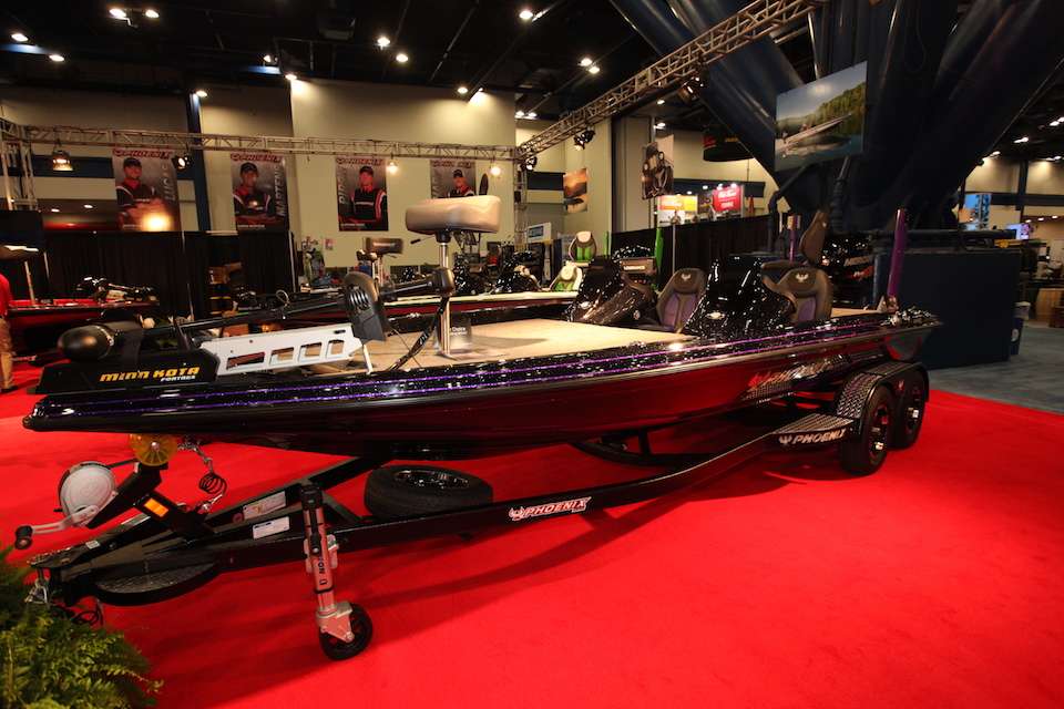 Here is the new flagship model of Phoenix Boats. Itâs the 921 PHX with a wider front deck, ability to house 12-inch electronics in both bow and console, and a single front lid with center rod box capability. The 921 PHX is 21-feet, 6-inches in length, with a wide 96-inch beam just like the 921 Pro XP. It has a host of standard features including a Lowrance HDS 12, Lowrance HDS 9, custom boat cover, padded front deck and many others. 