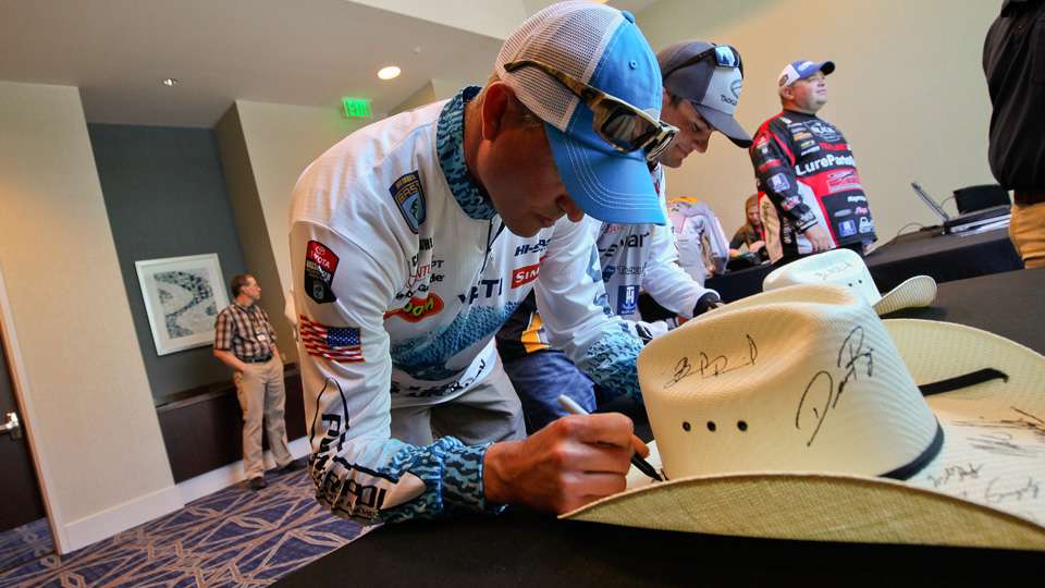 There's always memorabilia for competitors to sign at the Classic, such as the cowboy hat Casey Ashley is signing. 
