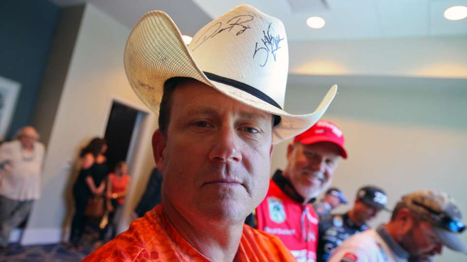 Skeet Reese signed the cowboy hat, too, then gave it a try. 

