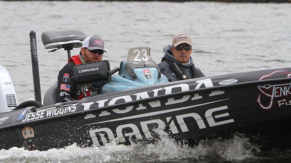 Jesse Wiggins, one of 52 contenders in the GEICO Bassmaster Classic presented by Dickâs Sporting Goods, takes a look at his electronics as he leaves one of his Day One fishing spots in search of something else.