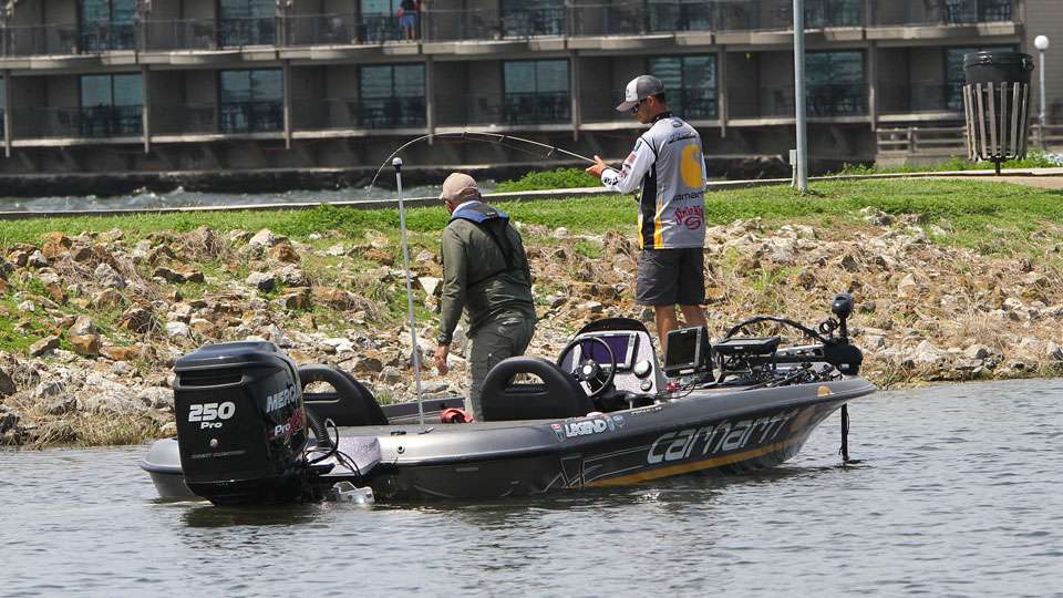Lee gets ready to lift a bass into the Carhartt rig.