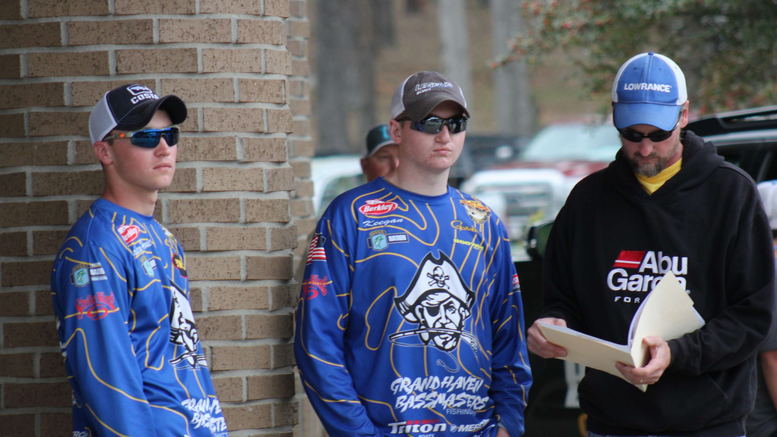 Grand Haven (Mich.) High anglers traveled 1,100 miles to
compete in the Costa Bassmaster High School Central Open here in
Louisiana. From left are Bailey House, Keegan Findley, and captain
Scott Findley.