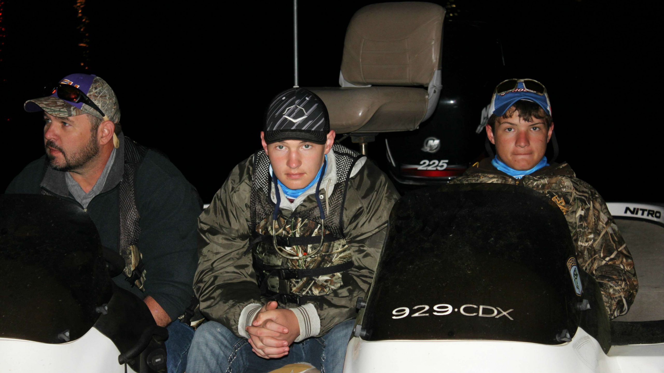 Mark Van Matre, Dylan Van Matre, and Dustin Van Matre patiently await the day's fishing action.