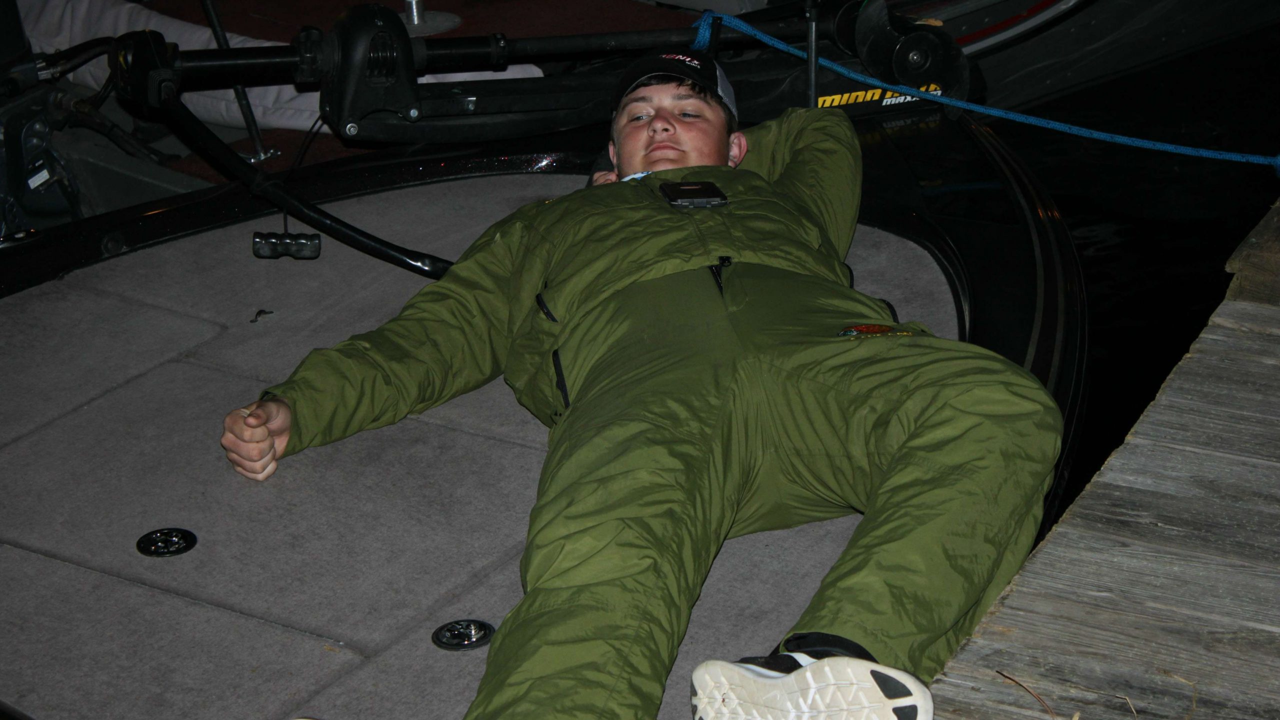 Colby Badeaux of Live Oak (La.) High reclines on the bow of
his day's ride. Many of the young anglers were up at 2 or 3 a.m. to
make their way to the launch for a 6:15 a.m. take-off.