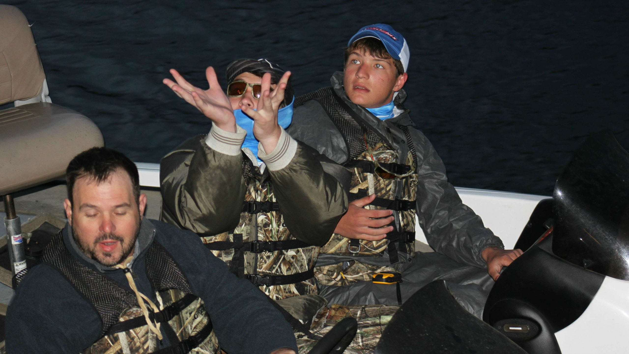 This angler prepares to catch his boat number from a B.A.S.S.
official upon departure.