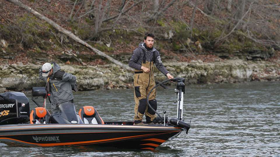 Freeman and Brooks pull up the trolling motor.