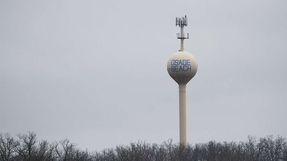 The Osage Beach water tower stands tall and is visible from the water.