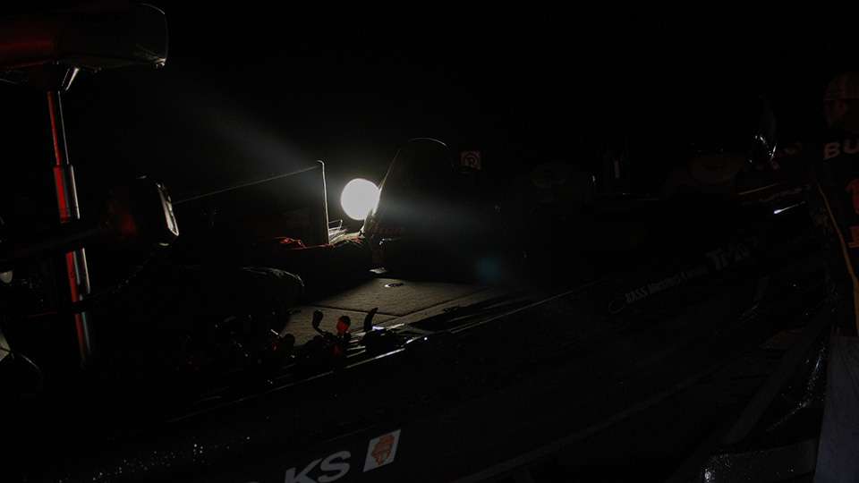 Teams used a spotlight to rig their tackle in the dark.