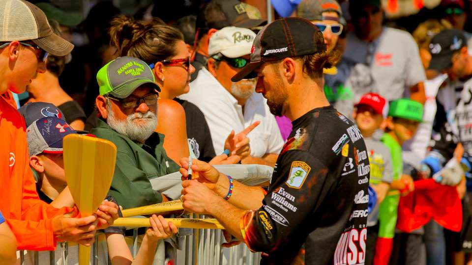 The bass go back into Toledo Bend. A long line has formed near the stage as fans wait for autographs, selfies and to meet their favorites. âThis is about the only pro sport that is participatory and it is just awesome. What is really cool about it is weâus and the fansâall love the same thing.â Bass fishing. 
