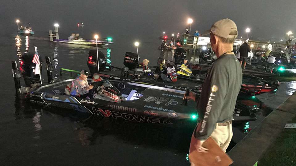 Early Wednesday morning, tournament director Trip Weldon oversees boat parking as B.A.S.S. lined up the anglers in order of their Day 1 start in a dress rehearsal. Fog delayed the run-through for some time.