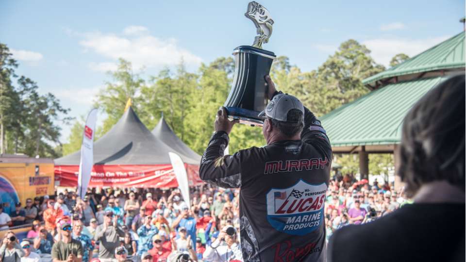 The moment is here. The two hands hoisting the trophy belong to John Murray, one of the most decorated western anglers alive. Murray has won too many boats to count and over $1 million in cash winnings. This trophy will be his favorite. 
