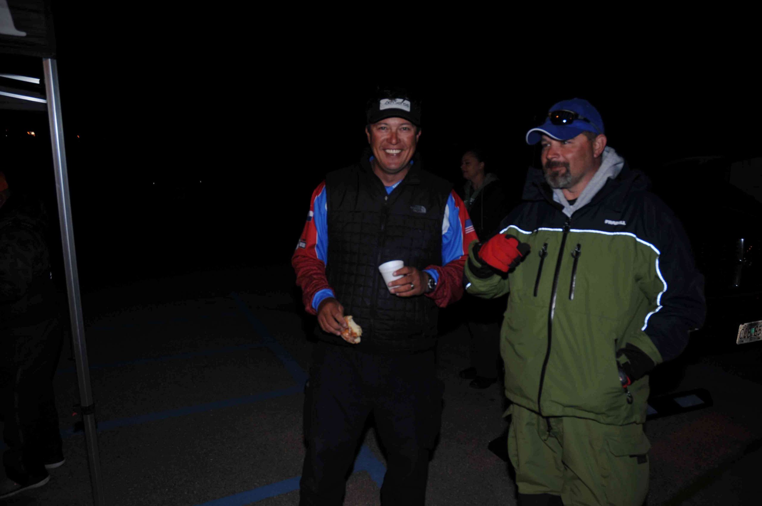 Missouriâs Marcus Sykora downs a doughnut and talks fishing with his non-boater partner, Ohioâs Jody Adkins.
