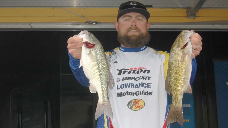 Ray Archer of the Colorado Team with a mixed bag of bass.