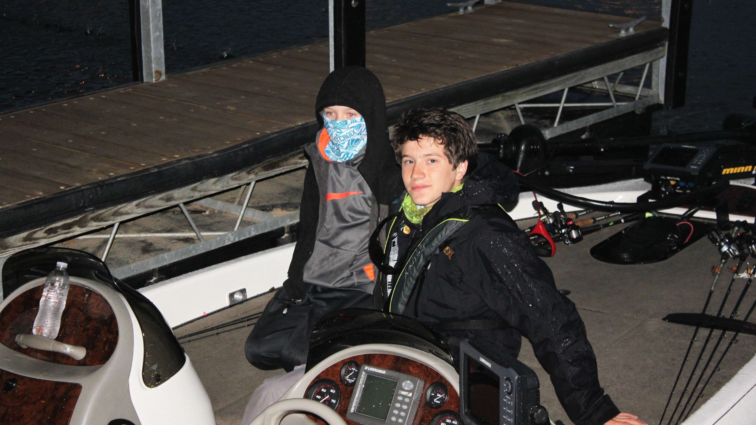 Trey Schroder is bundled up behind blue face gear, but fishing partner Grant Nisbet gives a smile. The boys fish for Lindbergh (Mo.) High School.