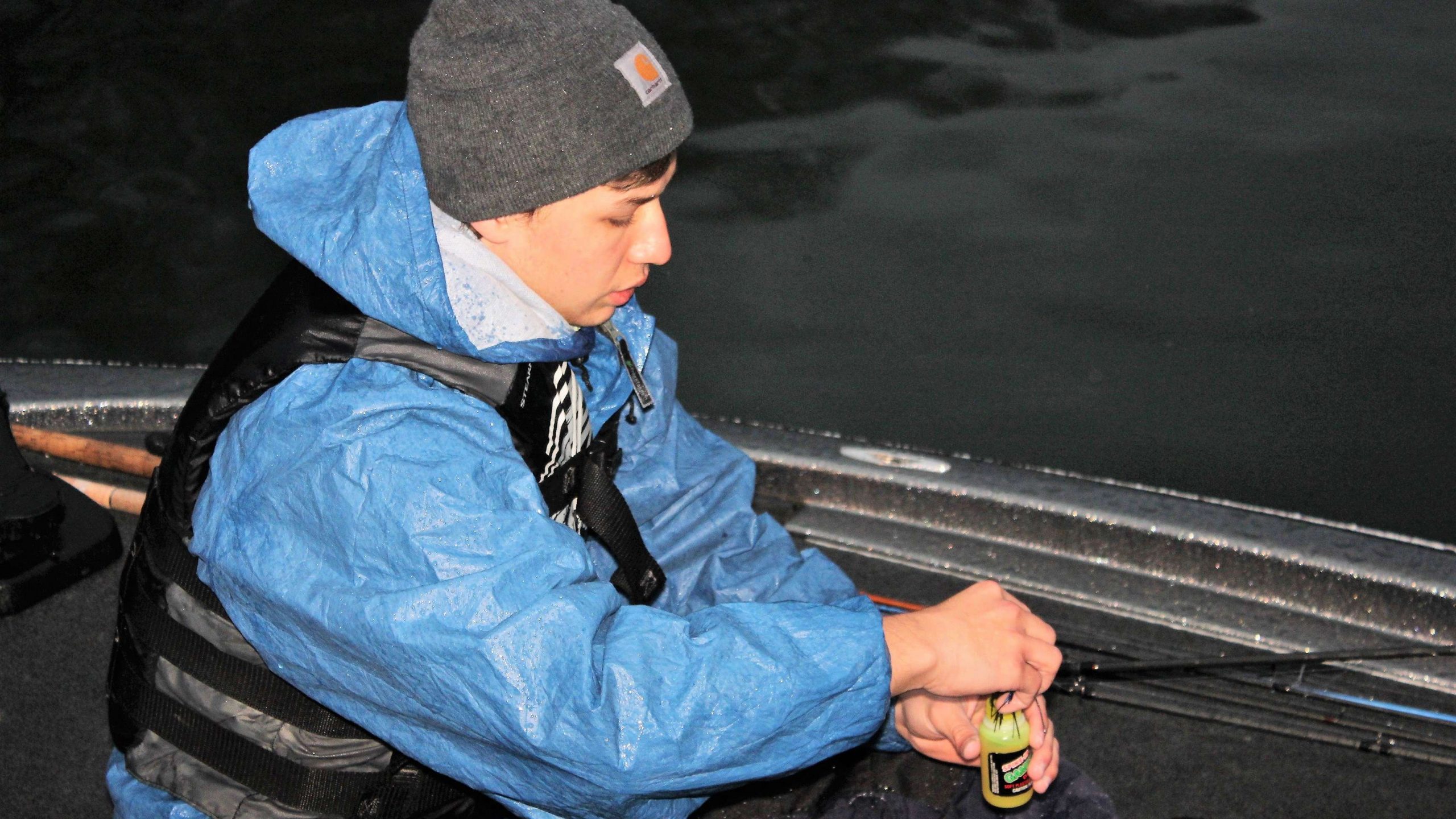 Noah Lewis of the Raintree (Mo.) High School Anglers Club readies a lure for fishing.