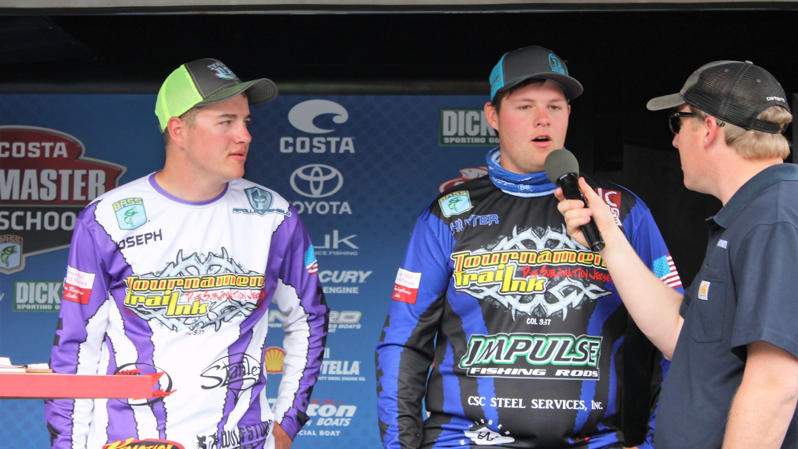 The Texas tandem of Joseph Bruener and Hunter Curry talk with Hank Weldon after weighing five bass that totaled 11-14.