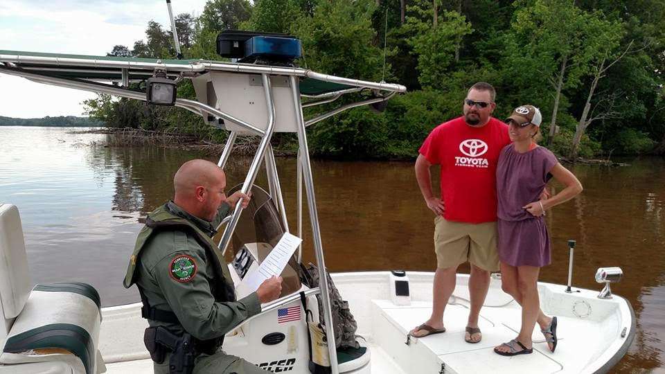 They were married by a Tennessee Wildlife officer on the water during a spur of the moment wedding ceremony. 