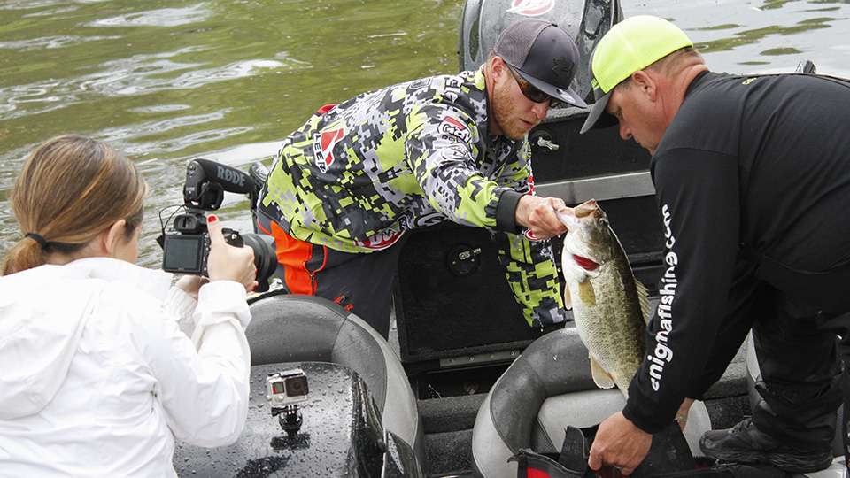 Day 1 leader Hunter Shryock bags up his fish. He dropped to 2nd place, but had 18-14 on Friday.