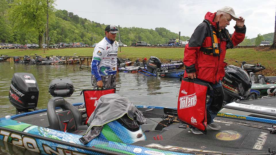Joey Nania and his co-angler head to the scales with their bags of fish.
