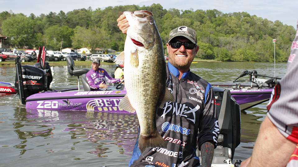 Josh Douglas holds up this beastly 9-pound, 9-ounce giant that anchored his 24+ pound weight.