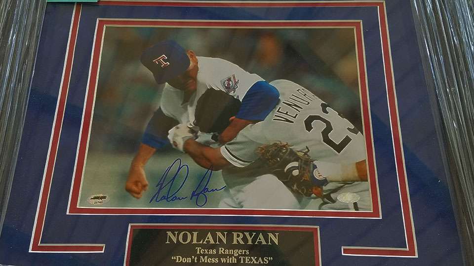 One of many sports memorabilia items in the online auction was this shot of Nolan Ryan having a time out on the mound.