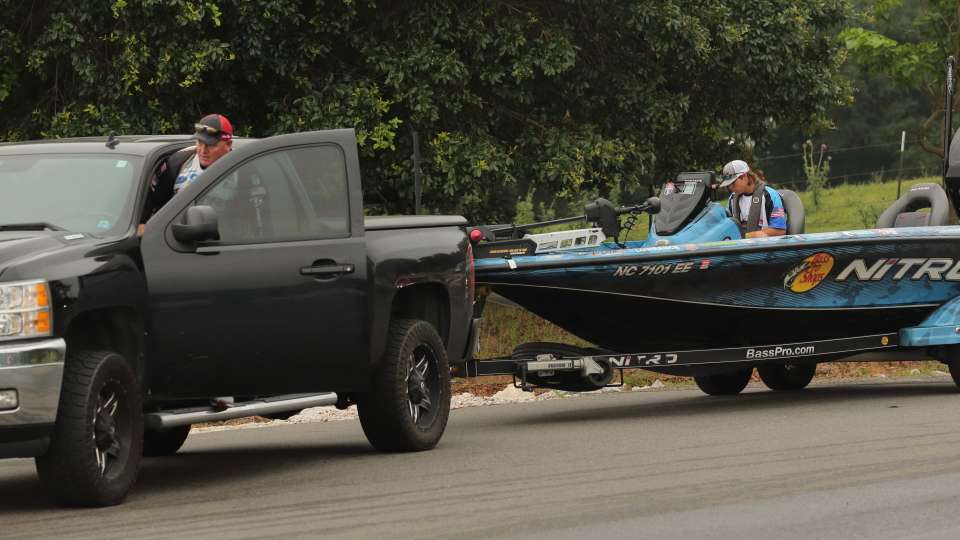Bassmaster Elite Series pro Shane Lineburger and High School All-American Colby Miller ready the boat for launch.