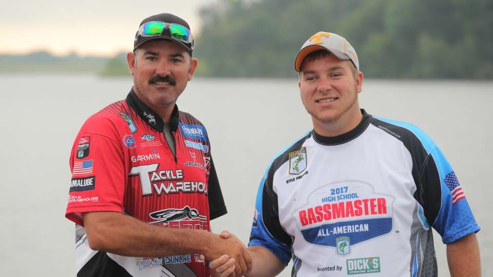 Jared Lintner and Kyle Palmar shake hands before getting out on the water.