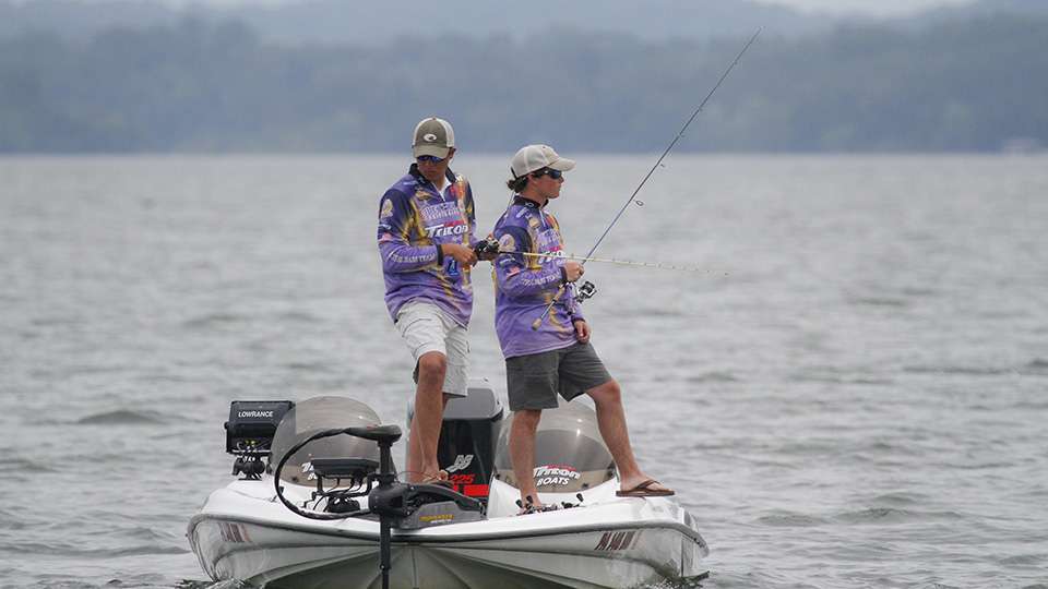 Garrett Enders and his teammate, which I found across the lake earlier, were trying another spot.
