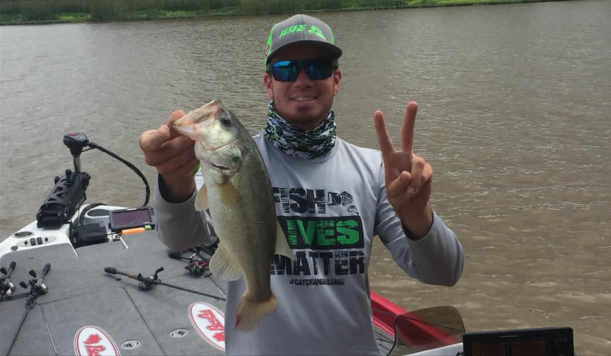 Adrian Avena wading through the short fish to get his 2nd keeper of the day...