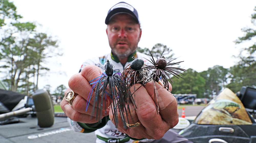 Jigs. You just can't have too many jigs. He said they are likely the most versatile lure in existence, and one of his favorite ways to catch bass. He suggested natural colors, round heads, football-style heads, and swim-jig-type heads that are effective around brush. Just get a bunch and learn how to catch bass on them, they'll pay off all year on every lake across the country.  