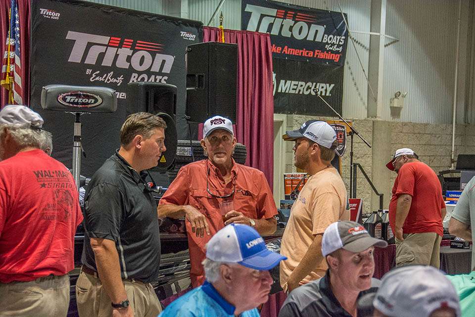 Adam Atkison, Vice President of Triton Boats talks with one of the teams prior to the rules meeting.
