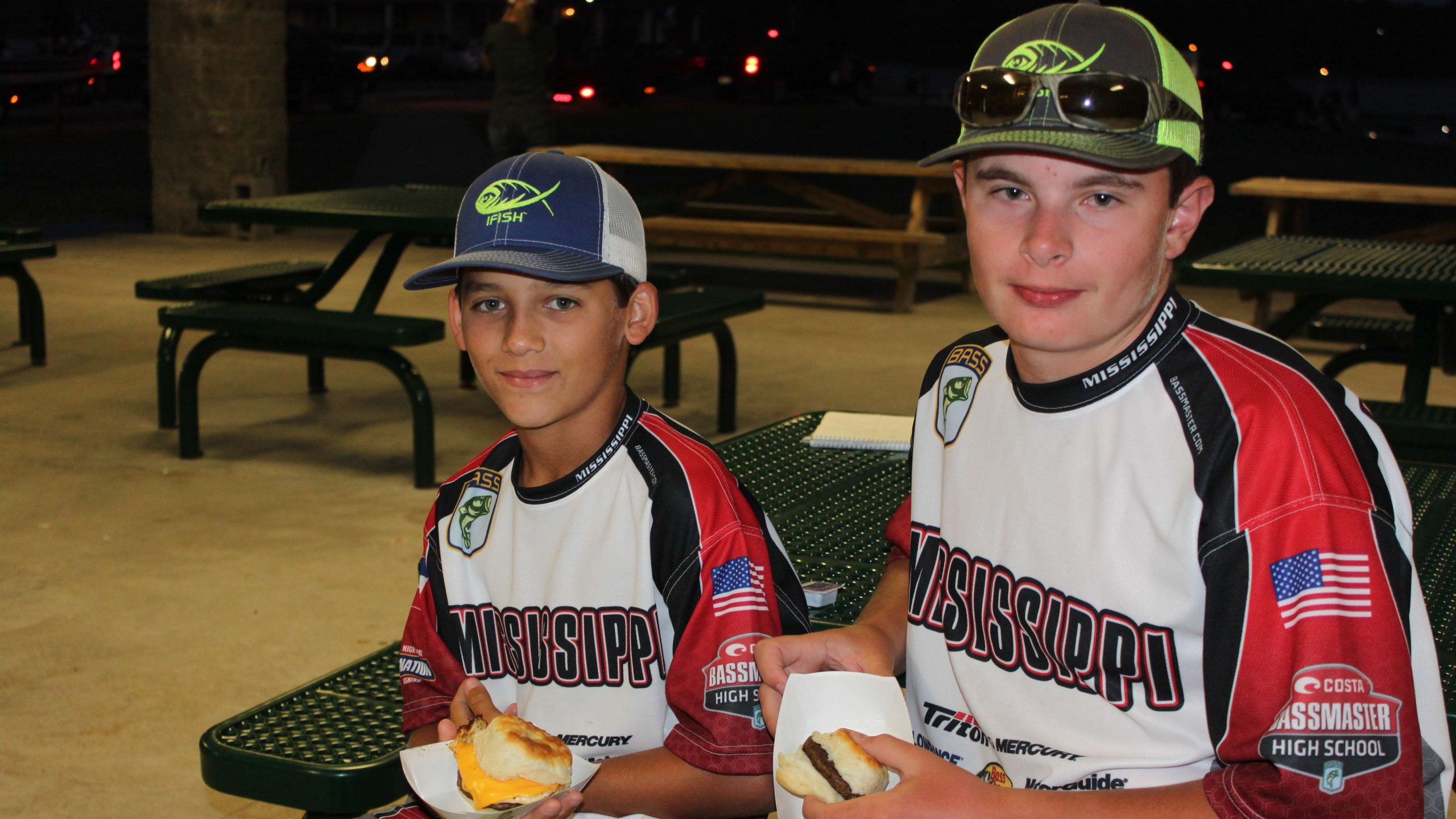 Mississippi's Calup Williams and Phillip Herring snack on some breakfast biscuits before taking the water.