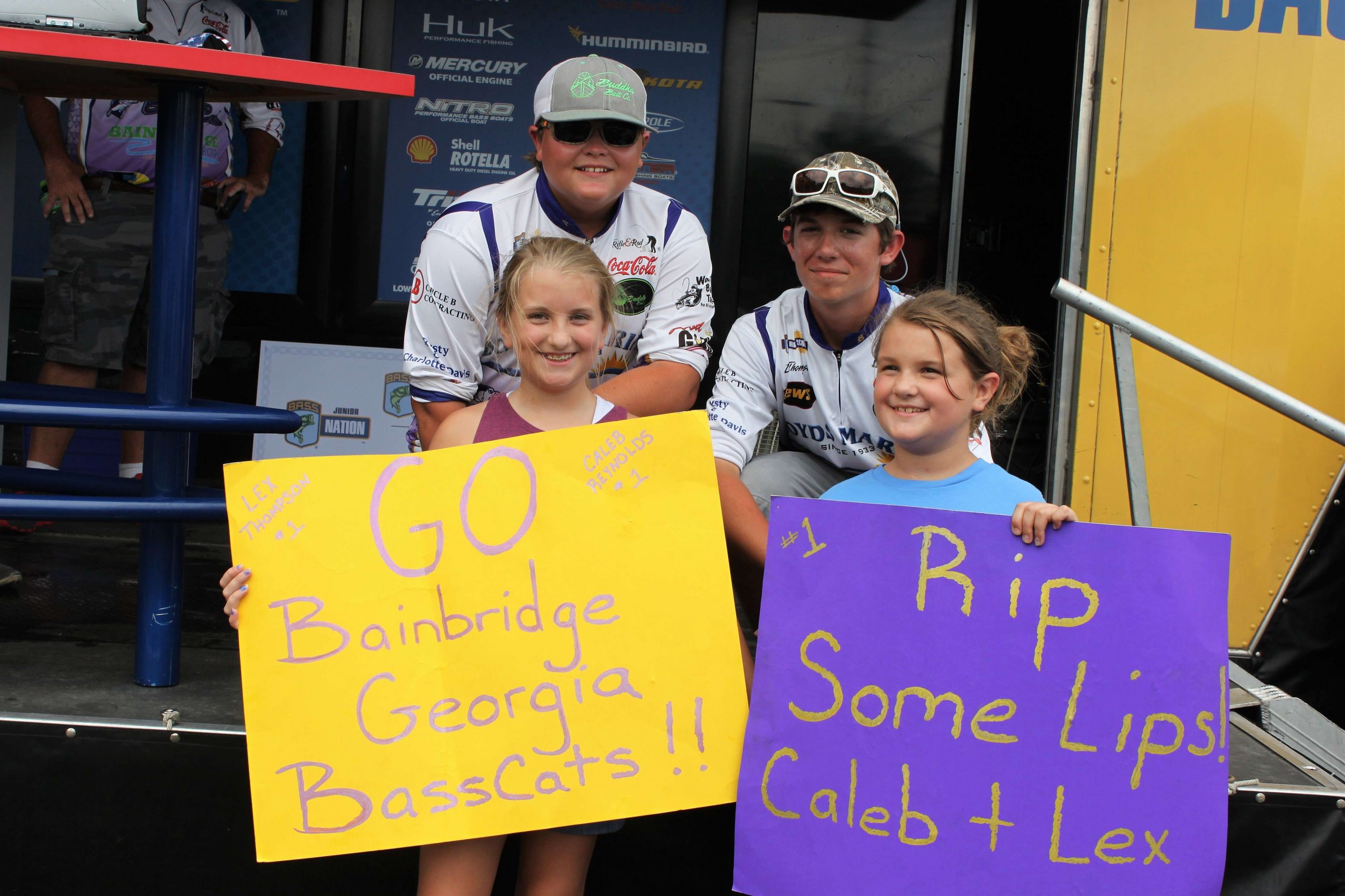 Caleb Reynolds and Lex Thompson of Georgia had a big group of supporters to cheer on their 31st place finish. Lexâs sisters Dallis and Drew shared the encouragement on these purple and gold signs. Thereâs the family spirit!

