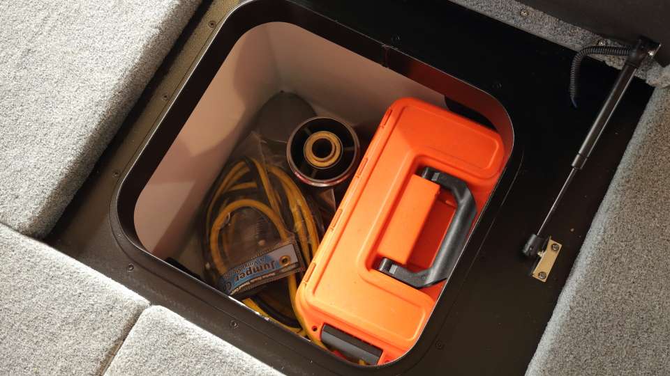 In the box behind passenger seat, you'll find a spare prop, prop wrenches, a fire extinguisher, a pair of stainless steel pliers and jumper cables. 