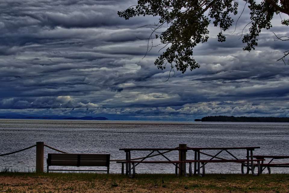 Lake Champlain, or Lac Champlain as the French Canadians call it laps the banks of two countries, U.S. of A. and Canada, and two states, New York and Vermont.  It is a bit over 500 square miles of water, and as you can see here seeâs its fair share of stormy weather.
