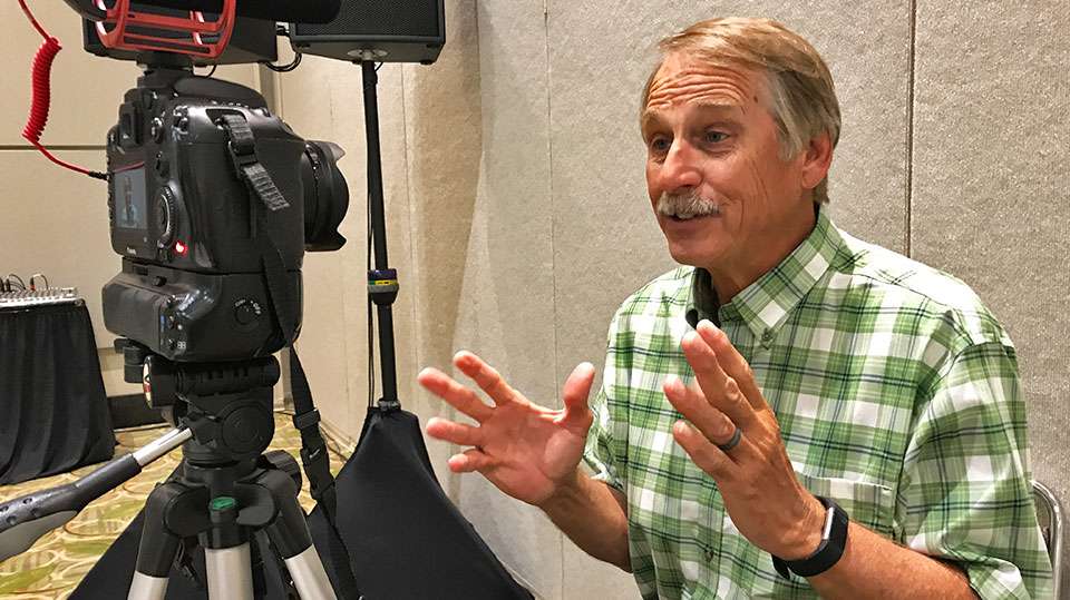Hank Parker takes some time from his hectic schedule at ICAST to record a video for the 50th anniversary of B.A.S.S. Parker, who he knew he wanted to be a bass pro early in life, lived his dream with two Classic championships.