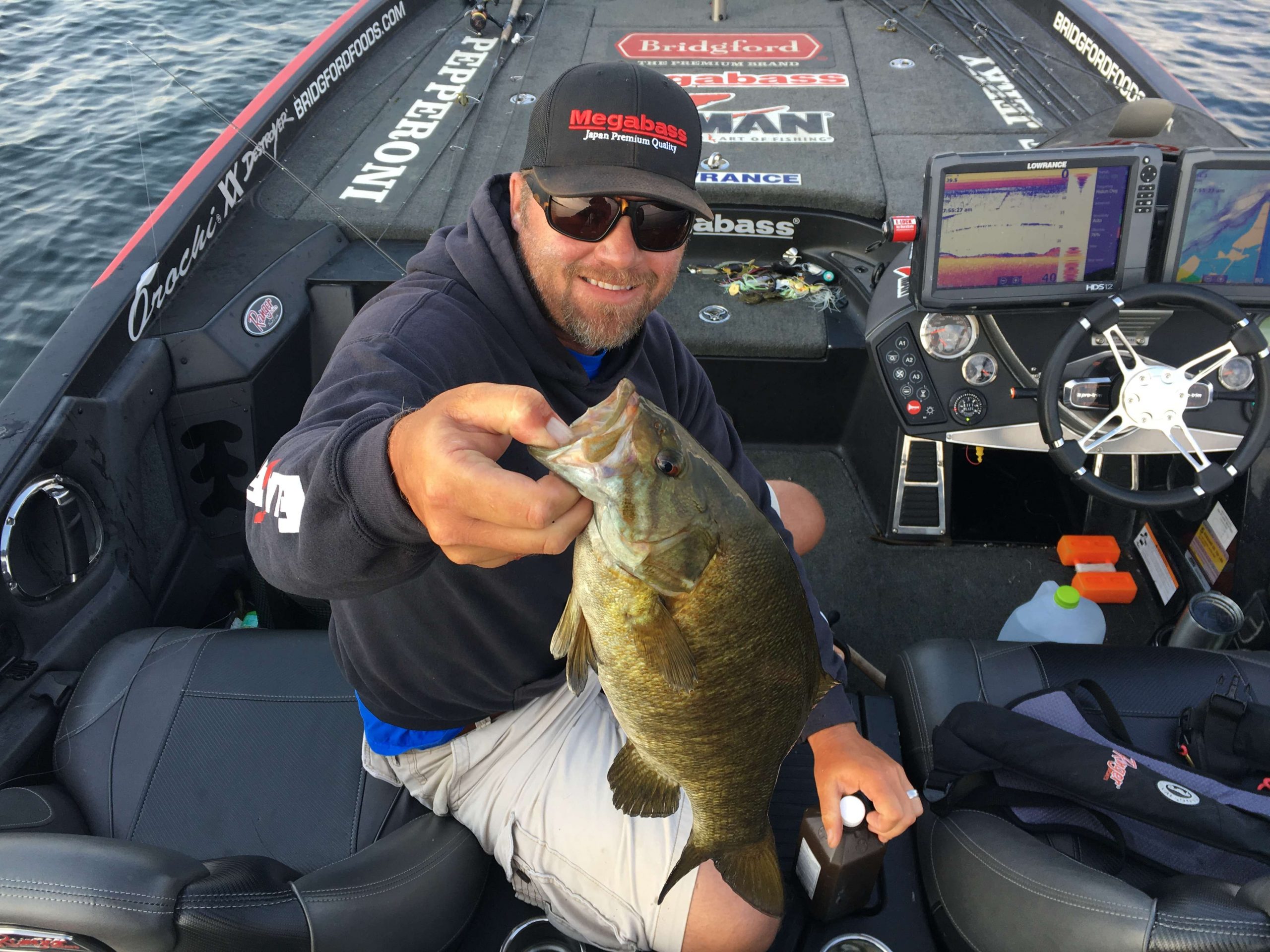 Luke Clausen, after bending the rod on two that didn't get in the boat, just landed a fat chunk that looks to be about 2 3/4-pounder.  Hopefully there are so more cooperators ready for a boat ride.