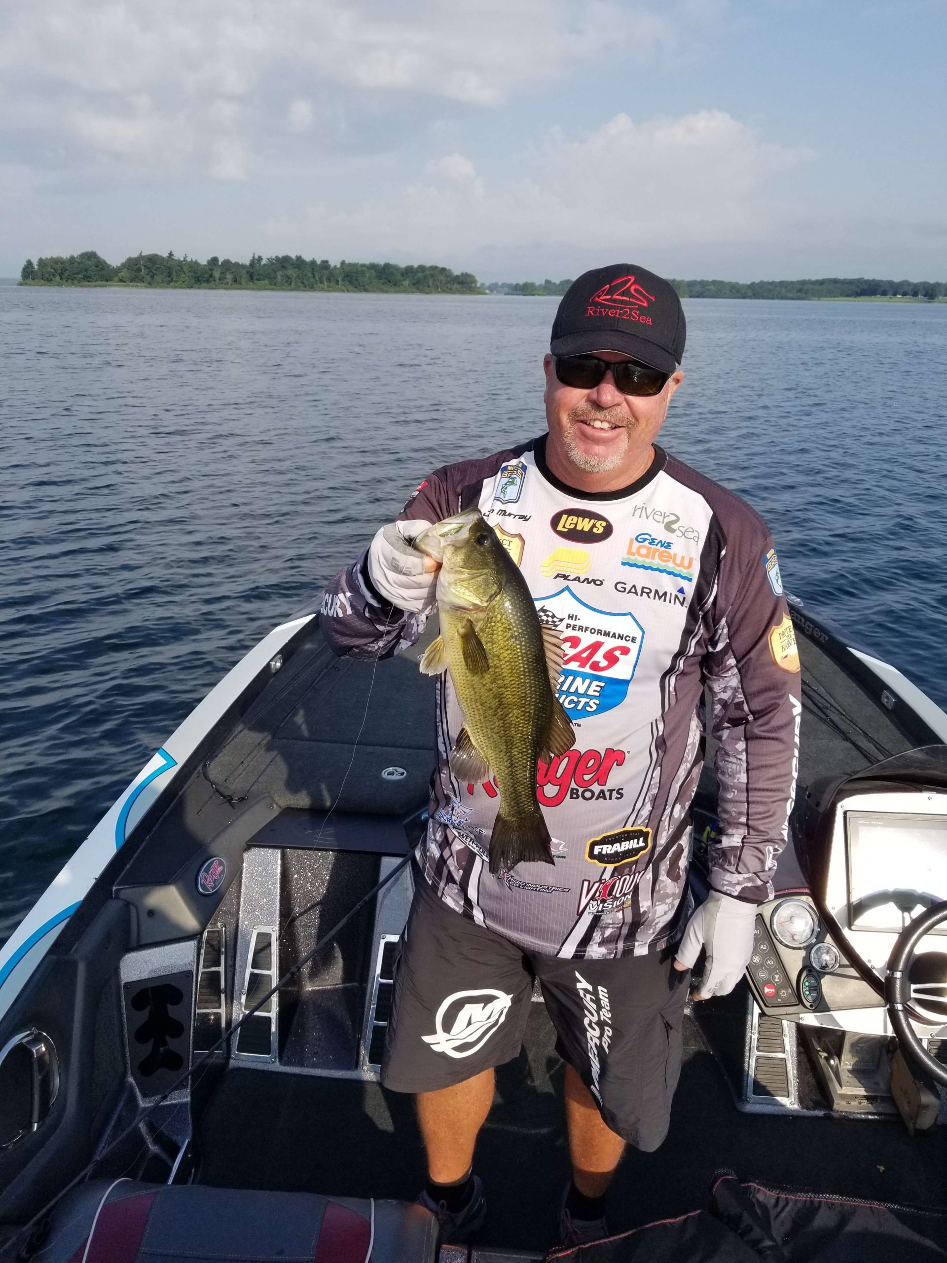 Murray breaks the ice and boats this nice pound and a half largemouth.