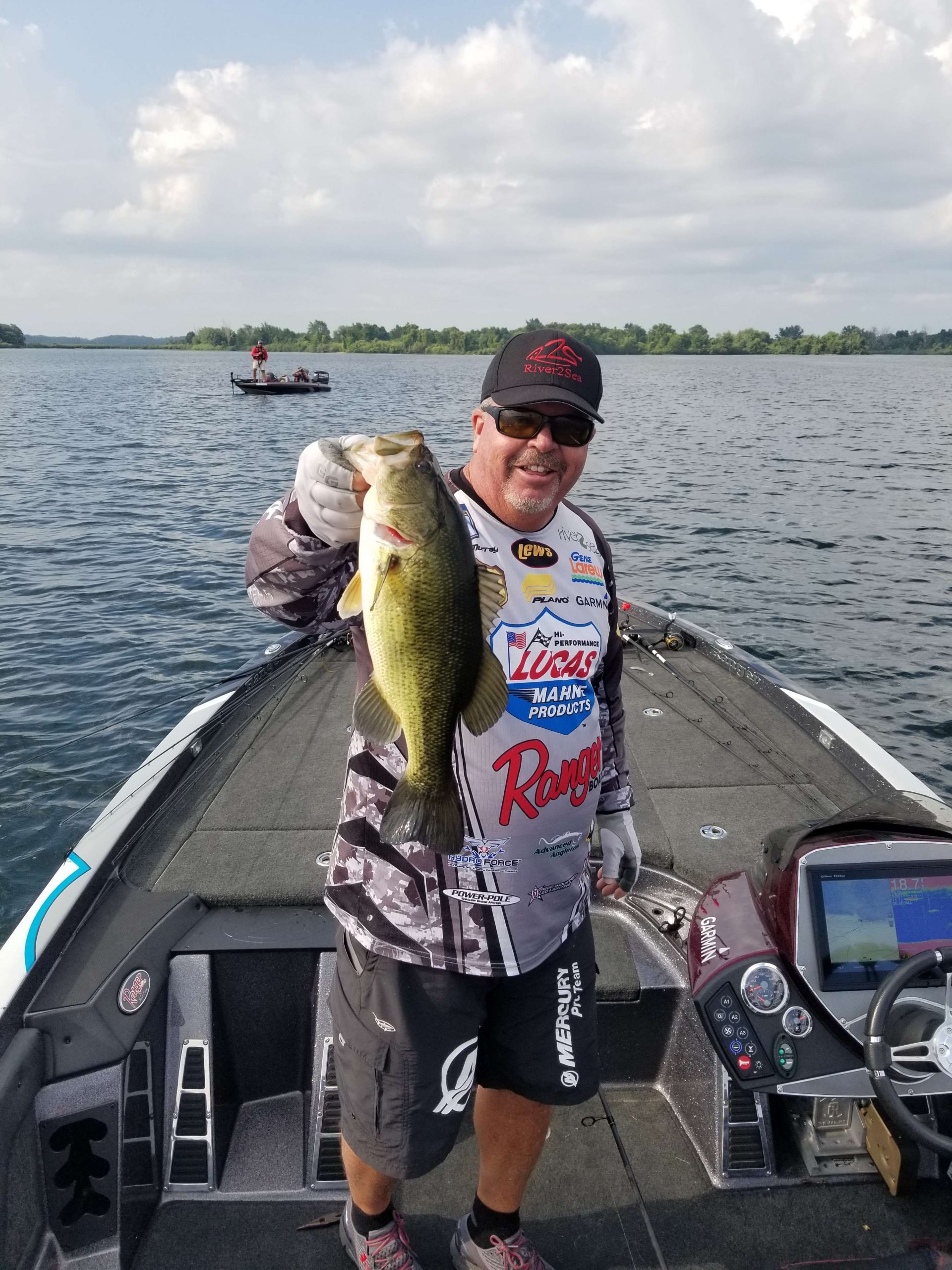 Murray boats No. 5 , largemouth are liking him today. You can see the relief in his face, with five in the live well. 
