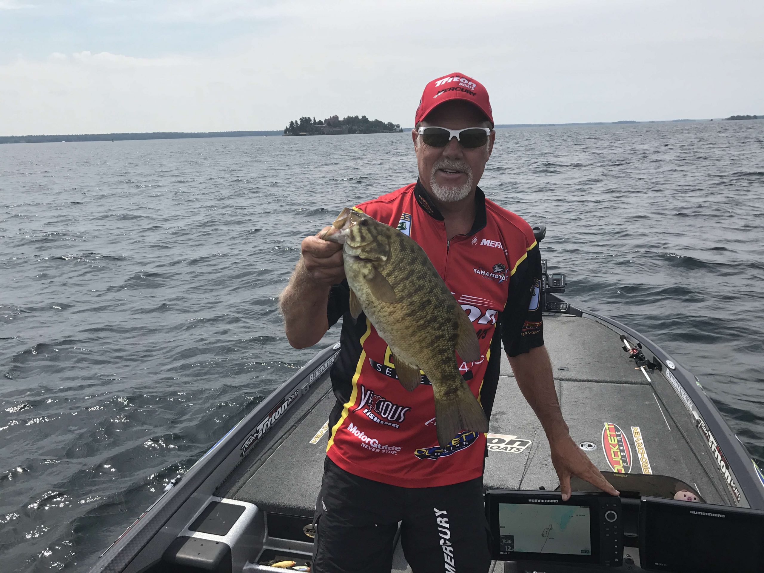 Nothing tugs like a smallmouth. Boyd Duckett putting this one into the livewell. 